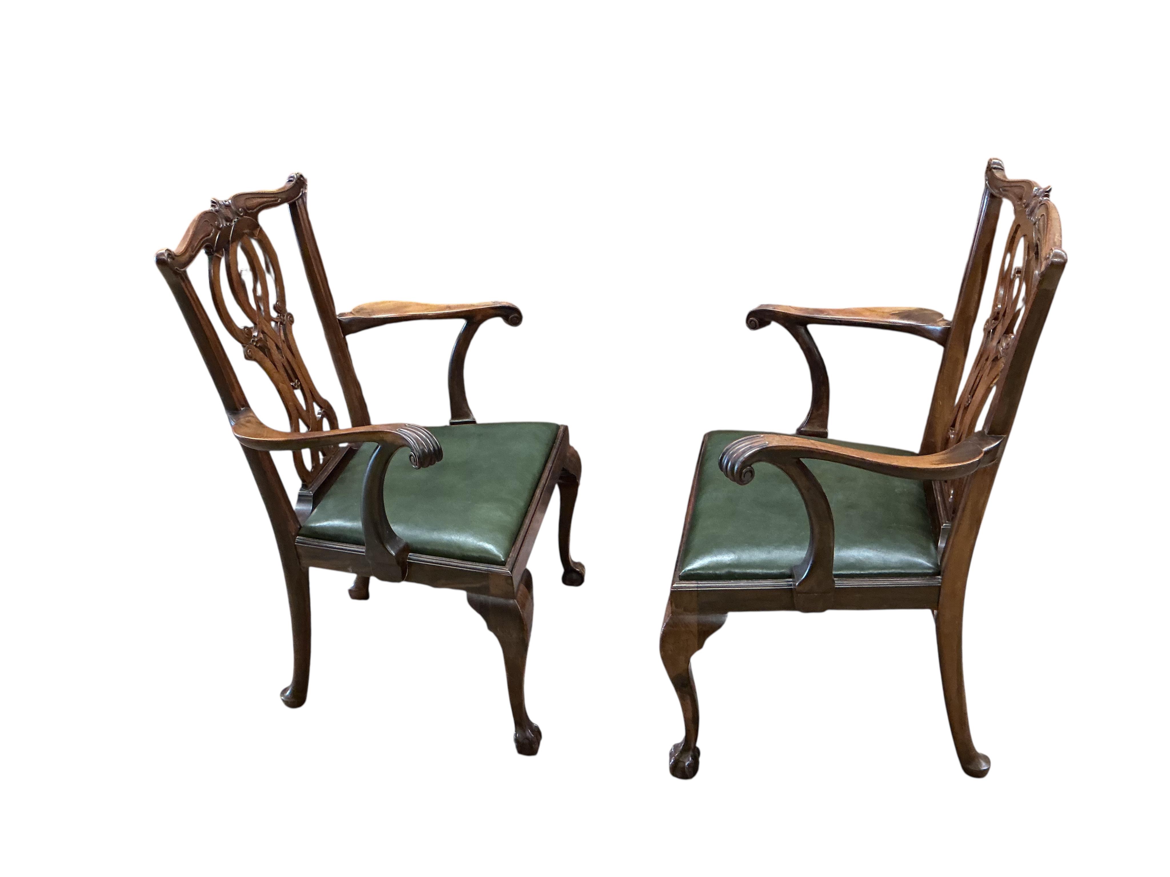 A set of nine Chippendale Revival mahogany dining chairs, two with arms